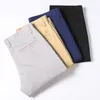 Verão Novos Homens Fino Algodão Khaki Calças Casuais Negócios Cor Sólida Calças Trousers Marca Cinza Masculino Plus Size 40 42 44 210406