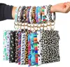 PU llavero pulsera cartera mujer bolso cuero borla colgante bolso leopardo girasol estampado pulsera señoras bolso regalo 14 colores