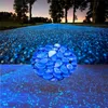 100ピース/ロットの発光石の輝き暗い装飾的な小石の歩道芝刈り機庭の庭の蛍光明るい装飾的な石