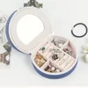 Mini estuche organizador de joyas de viaje creativo, bolsa de almacenamiento redonda, soporte para collar, pendientes y anillo con bolsas de espejo