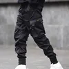 أشرطة الرجال كتلة اللون الأسود جيب البضائع السراويل 2019 ركض الحريم المتناثرة sweatpant الهيب هوب السراويل F1210