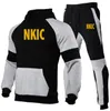 Мужчины Splice Sportswear Set Brand Mens Cousssuit Спортивная Фитнес Одежда Две чашки Длинные Рукава Куртка + Брюки Повседневная Мужская След.