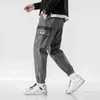 Męskie kieszenie boczne Cargo Harem Spodnie 2021 Wstążki Hip Hop Casual Mężczyzna Joggers Spodnie Moda Wygodne Spodnie Streetwear H1223