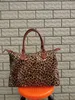 2021 Новая дорожная сумка для выходных Furry Cow Leopard Print Дорожная сумка на короткие расстояния Большая вместительная сумка Furry Handbag