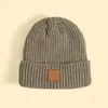 79129 USA Designer Vinterstickad CH Beanie Etikett Vinter Vertikal Stickad Ullkeps Unisexvikt Casual Beanies Hat 5 Färger Toppkvalitet