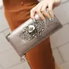 2020 Nytt metallskalle mönster Long Wallet Handväska dragkedja skelett handväska kopplingskort hållare plånbok kvinnor carteira feminina328v