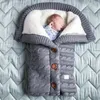 Recém -nascido bebê Baby Sleeping Blain Knit Crochet Inverno A quente e macio envoltório saco de dormir para carrinho de bebê Beddingg4 Y2010099627202937