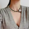 Lyxiga nya märkes smycken Double Pearl Camellia Halsband Kvinnlig Metall Collocation Leather Personlighet Elegant Mair Maiden 2021
