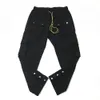 pantalones de nailon negro