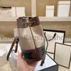 Bolso de diseñador de lujo de alta calidad 10A Moda para mujer CrossBody Lienzo Impreso Bolso para mujer Bolso de hombro monedero 2024 Mini cubo Carteras cruzadas Bolsos