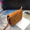 Updated New Luxurys Crossbody Bags Suede Stitching Leather Designers Shoulder Bags Golden Buckle Hardware Baguette Long Strap Criss Cross#1