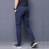 Męskie spodnie Summer Męskie Skinny Stretch Korean Casual Spodnie Slim Fit Chino Elastyczny Talia Jogger Dress Spodnie Mężczyzna Czarny Blue1