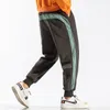 Side Striped Sweatpants Men Brand New Jogger Pants Hommes Mode Streetwear Hip Hop Pantalon Homme Loose Fit Harem Pantalon 201106