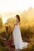 New Designer Bohemia Wedding Dresses Spaghetti Straps Split Lace Chiffon Bridal Gowns Backless Sweep Train A Line Wedding Dress Custom