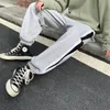 Calças masculinas 2021 engrossar veludo casual hip hop estilo calças moda homme streetwear preto / cinza cor corda de moletom M-5XL1
