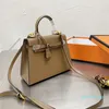 Designer- Mulheres sacos de moda bolsas de lona clássica bolsas de couro sólido portátil portátil carteira de ombro 25cm bolsas