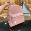 luxury designer m women fashion bags backpack knapsack twotone letter artwork zipper free pendant lady fashion knapsack