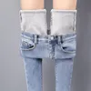 Jeans invernali donna coreana a vita alta più velluto skinny jeans donna 2019 nuovo denim streetwear spesso caldo inverno piedi pantaloni T200103