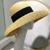 Wide Brim Women Sun Wheat Straw Summer Beach Hat Elegant Cap UV Protection Black long Ribbon Bow Derby Travel Hats Y200714