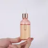 5ml 10ml 30ml 50mlのエッセンシャルオイルの滴ボトルの香水のための香水のボトルローズゴールドのふたが付いています