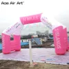 El arco publicitario inflable rosado intrépido viene con la aduana libre del PVC del ventilador tamaño para el evento