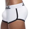 JOCKMAIL Boxers de sous-vêtements pour hommes rembourrés Trunks sexy poche de pénis gay renflement améliorant l'avant arrière Double tasse push up amovible Y200415295K