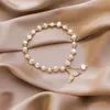 Semplice e dolce braccialetto di perle rotonde da donna piccolo braccialetto di perle d'acqua dolce bellezza coda di pesce Jewelry1264R