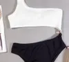 白黒ワンショルダー水着ワンピース中空点ボディスーツモノキニストリング包帯水着女性水浴スーツT200708