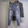 selling street wear splash ink cat mustache Ripped hole spring youth old frayed School teenager men's fashion jeans 220115