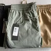 2022 One Lens Logo Zipper Pocket Pants Nylon Metal Quick Dry Men Pant Tracksuit Casual Jogging Byxor Black7821649