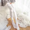 Vår och sommar damer solid färgkalv strumpor Långt rör över knä strumpor Japanska midrör strumpor Velve över 20color