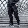 2021 хип-хоп уличная одежда грузовые брюки карманные мужчины Harajuku Harem Harem Harem Bags Swag ленты бегуны брюки черные хипсопные спортивные штаны High Street H1223