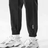 Męskie kieszenie boczne Cargo Harem Spodnie 2021 Wstążki Hip Hop Casual Mężczyzna Joggers Spodnie Moda Wygodne Spodnie Streetwear H1223