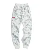 Printemps automne nouveaux hommes étoilé camouflage pantalons décontractés amoureux noir blanc lumineux lâche Hip Hop pantalon 281T