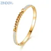 Bangle Zindov Women Armband Rostfritt stål Guld Rosfärger Vita toppkristaller Shine Brand Design Jewelry1