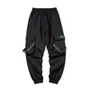 Мужские боковые карманы Cargo Harem брюки ленты черные хип-хоп повседневные мужские пробежки брюки мода уличная одежда 220315