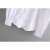 女性のレースかぎ針編みを倒すカジュアルホワイトスモックブラウスシャツ女性ホロウアウト刺繍ブルザパフスリーブトップLJ200812
