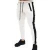 Sommar ny mode tunna sektion byxor män casual byxa jogger bodybuilding fitness svett tid begränsade sweatpants LJ201104