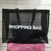 Hot Classic White Printing Shopping Mesh Bag Fashion Style Beach Travel Bag Women Wash Bag Cosmetic Makeup Storage Mesh Case