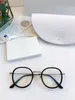 2021 nouvelles lunettes capricieuses dames lunettes lignes de coupe exquises mode tendance joker cadre rond rétro lunettes