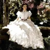 Vintage Princess Ball Gown Bröllopsklänningar 2021 Trädgård Ruffles Tiered Skirt Appliques Lace Golv Längd Brudklänningar Hög Neck Vikta
