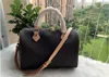 Mode Kvinnor 30cm Lås Key Travel Bag Classic Style Bags Duffle Shoulder Handväska Lady Totes Handväskor Duffel med Shoulde Jh-Iu