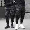 Homens Calças de Carga Preto Fitas Harem Jogos Casuais Algodão Streetwear Bolsos Hip Hop Pants Pants Harajuku Maré Moda Calças G220224