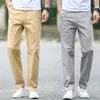 Verão Novos Homens Fino Algodão Khaki Calças Casuais Negócios Cor Sólida Estiramento Calças Marca Masculino Cinza Plus Size 40 42 44 201113