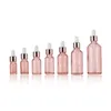 Bouteilles en verre rose avec couvercle en or rose Bouteilles compte-gouttes d'huile essentielle 5 ml 10 ml 30 ml 50 ml Bouteilles rechargeables Récipient cosmétique de voyage