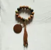 Commerce extérieur porte-clés personnalisé pendentif en bois blanc motif léopard perle gland bracelet