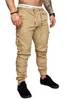 Men Pants 2018 Новая мода Мужчины бегают брюки. Фитнес -бодибилдинг спортивных залов для бегунов одежда Осенние спортивные штаны Размер 4xl