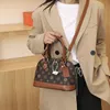 Wholesale factory ladies leathers bags This year popular printed handbag retro contrasting leather shell bag street trend Hong Kong wind spell color woman handbag