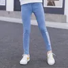 Девушка -подростковые джинсы скинни прибытие детей классические джинсы скинни с высокой талией Средние голубые джинсовые брюки Принт детских брюк LJ201127