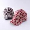 Adulto Leopard Animal Print Ponytail Gorra de béisbol Niños Criss Cross Washed Cotton Ball Cap Moda Leopard High Messy Hat 7styles RRA3820